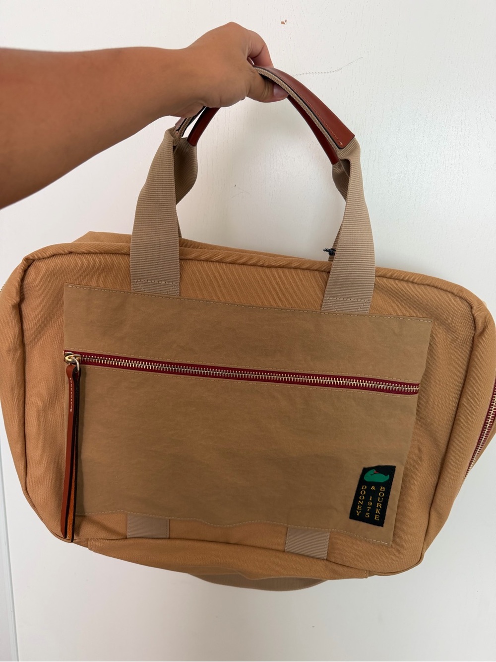 Dooney and Bourke Tan Canvas XL Overnight Bag with Red Trim